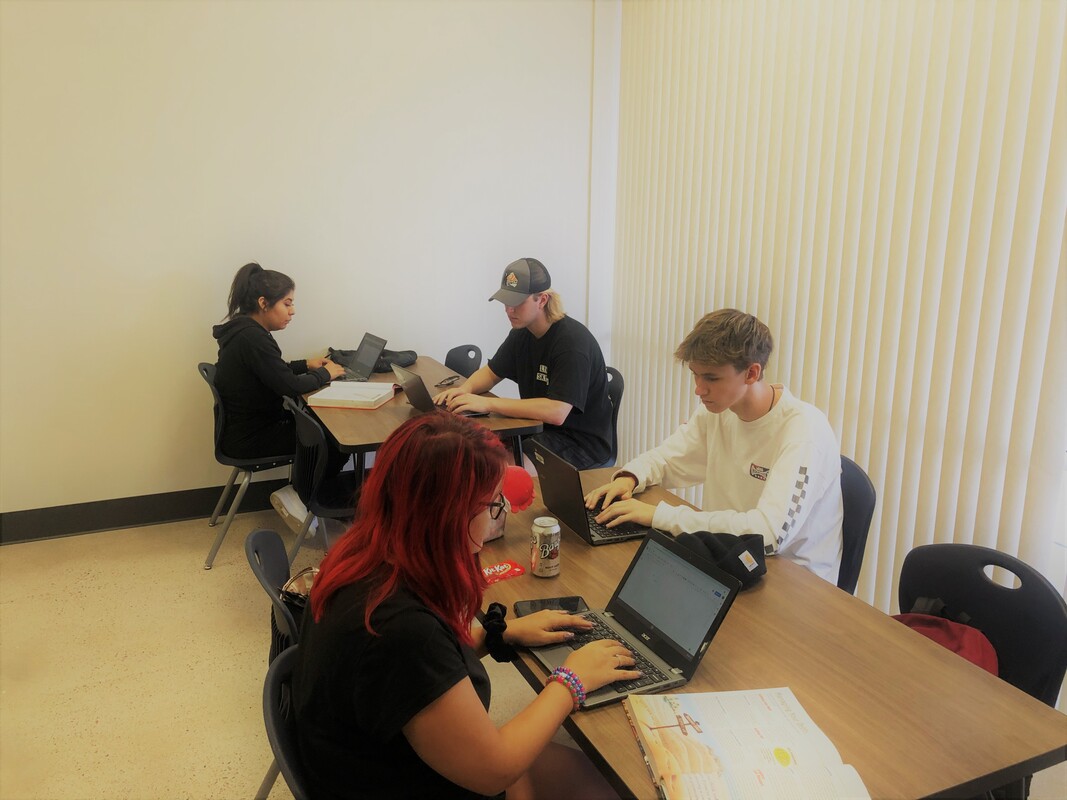 Students learning in a Deer Valley Academy classroom